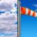 Mostly Cloudy then Sunny and Breezy