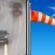 Breezy. Patchy Drizzle then Sunny